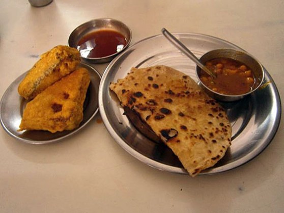 2. Breakfast - Paratha - fried bread, Chana - chickpeas curry, Fried slices of bread with sweet sauce